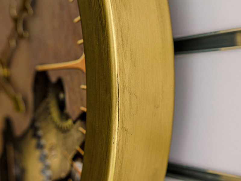 golden color metal rimmed clock with brushed antique finshing